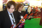 Adam & Ross playing Guitar Hero Arcade